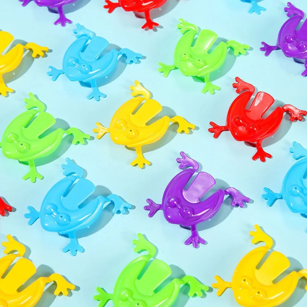 Lustiger springender Frosch aus Kunststoff, zufällige, hüpfende, lustige Spielzeuge, transparentes/einfarbiges Froschspielzeug