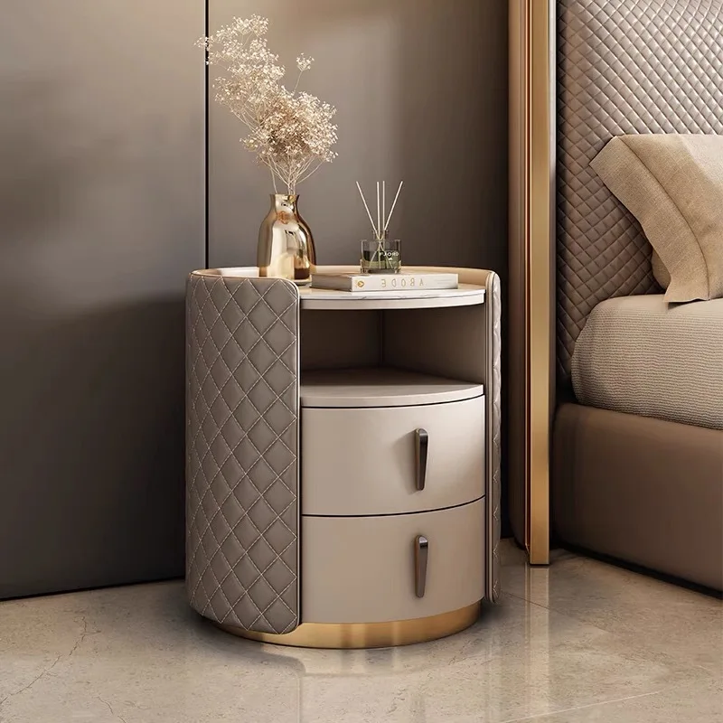

Light luxury minimalist designer high-end solid wood bedside table round modern simple bedroom free installation rock slab bedsi