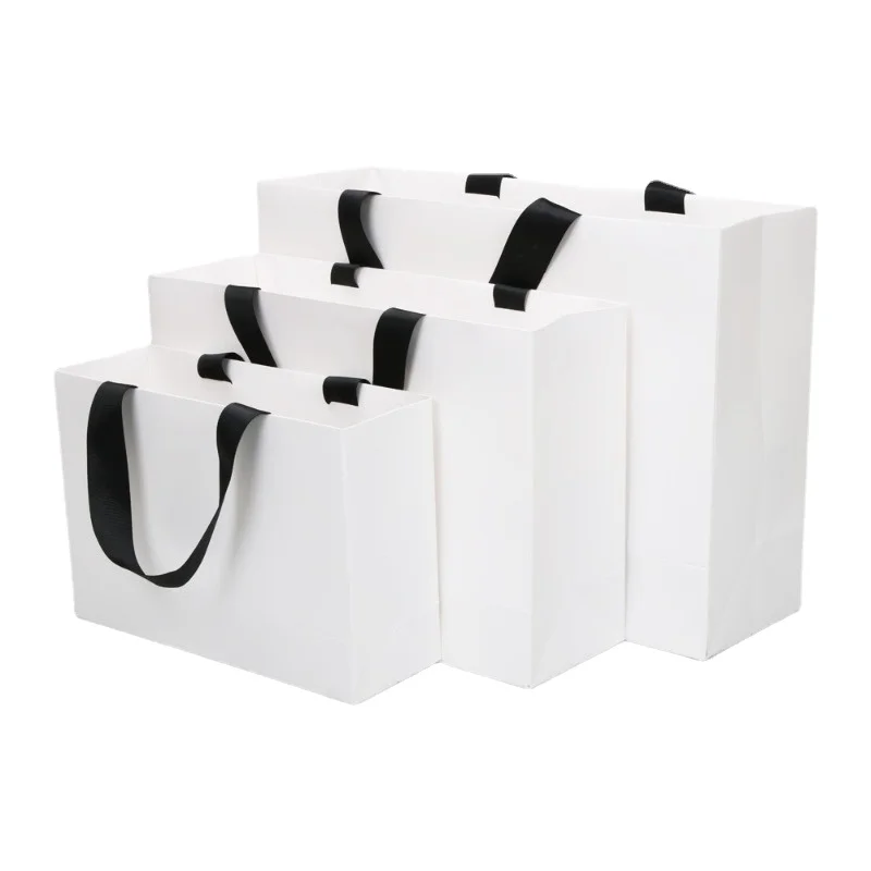 10 pz 250g sacchetto di imballaggio in cartone bianco di alta qualità regalo abbigliamento borsa Shopping sacchetto di carta portatile personalizza