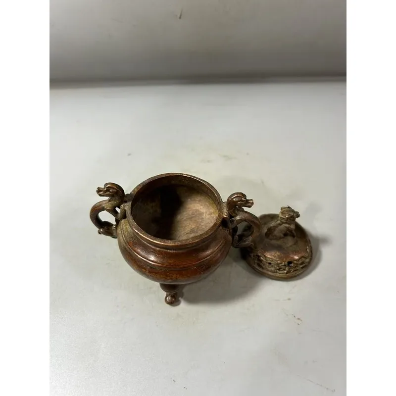 Two dragons playing with a pearl, a double-eared, three-legged incense burner, a Xuan De-style decorative piece for home use, su