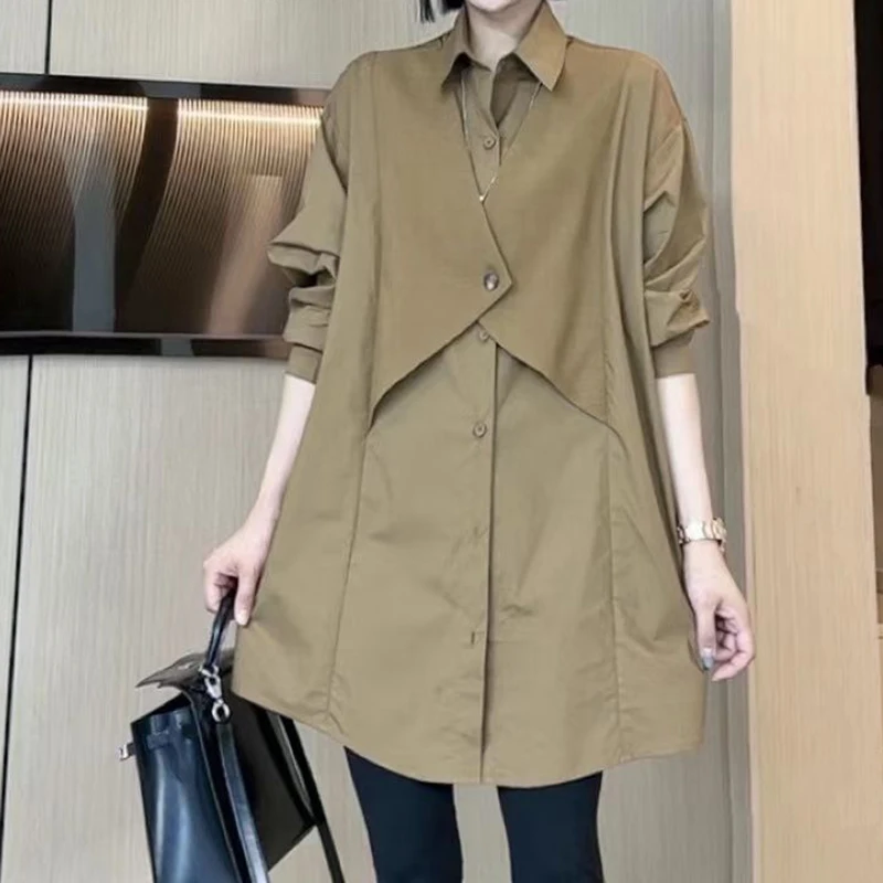 Vest women\'s new summer wear loose version of the fashion fake two pieces of stitching the same color in the long shirt top.