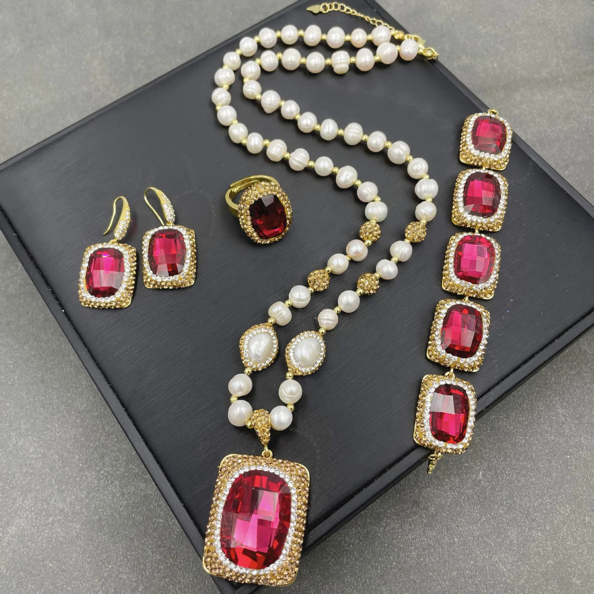 

New crystal luxury retro four-piece set oval exquisite point crystal banquet high-end atmospheric pendant earrings ring bracelet