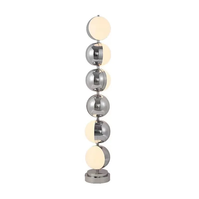 

Retro round ball floor lamp, stainless steel ambient light in the living room sofa decoration model room