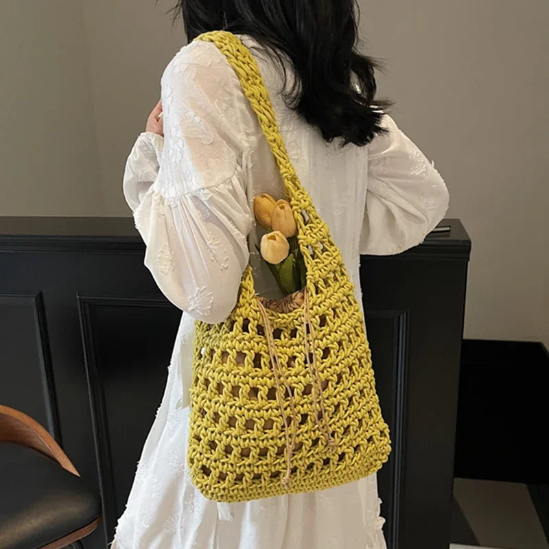 

Beach Bag Summer for Women Large Capacity Commuter Knitted Handbags New Hollow Out Vacation Drawstring Weave Pouch 1