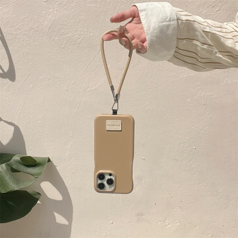 เคสโทรศัพท์หนังแท้สีพื้นแบบมีเท็กซ์เจอร์ระดับไฮเอนด์ ใช้ได้กับ Apple 16/15/14P เรียบง่ายและมินิมอล iPhone 13/12