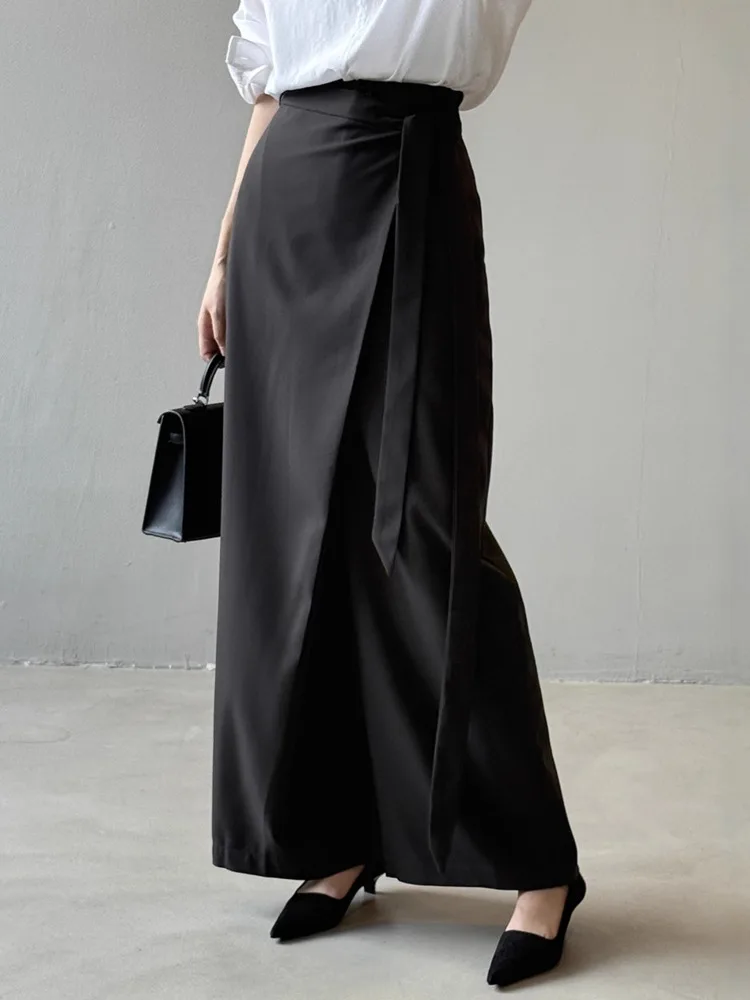 EAM Office Lady Style Black Solid Polyester High Waist Tie Asymmetric Wide Leg Beautiful Women's Pants 2026 Spring Summer New