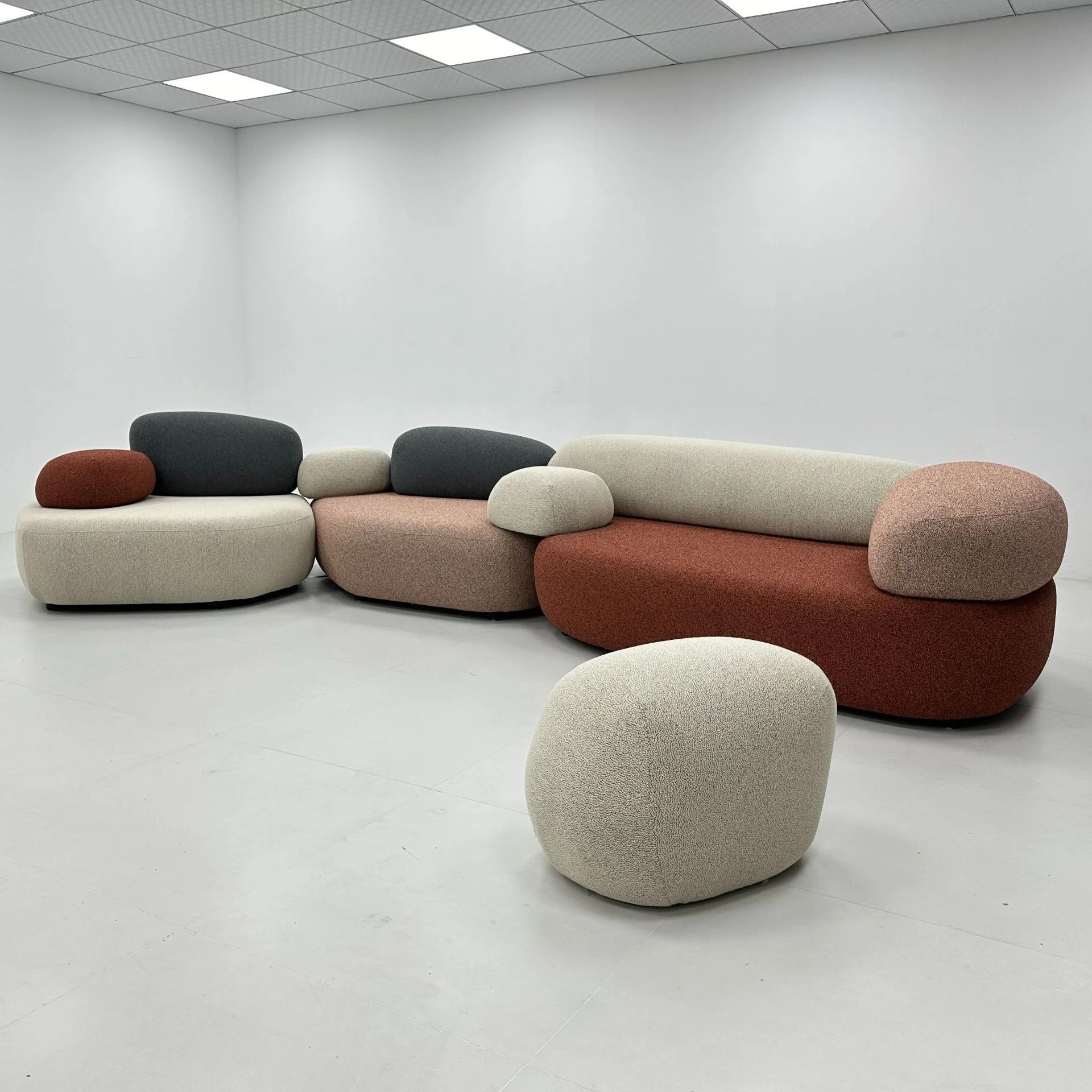 Modern Modular Curved Luxury Sofa New Unique Shape Design Velvet Sectional Fabric Cobblestone Sofa for Living Room Villa