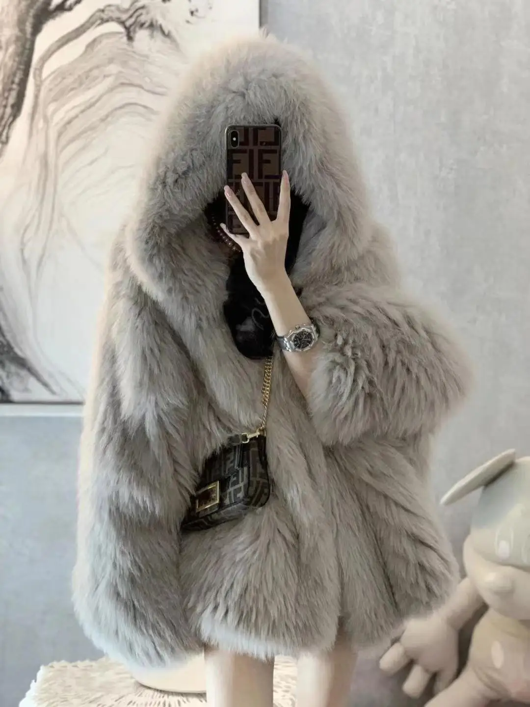 winter 2024 new Korean version of fox fur imitation fur coat women's medium length Internet red fried street hooded fur coat