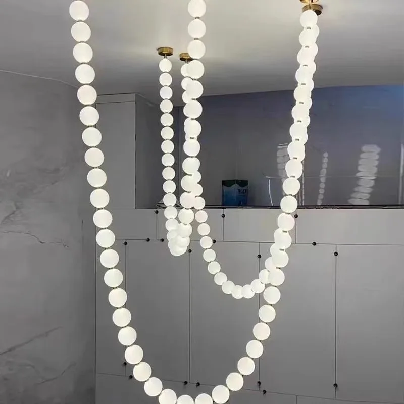 French bead duplex staircase living room chandelier, simple designer restaurant bar light, long pearl necklace light