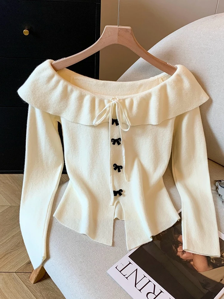 

Elegant off shoulder lotus leaf edge knitted sweater women's autumn and winter new Korean style slim fit versatile bow top