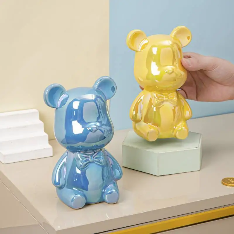 Ins Nordic Fashion Kids Cute Bear Piggy Bank Decorazioni Figurine da tavolo Casa per soggiorno Arredamento camera da letto Statue ornamentali