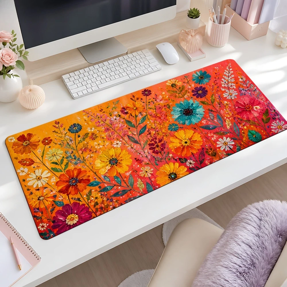 Mouse pad with a gradient background featuring blue, yellow and pink wild flowers. A non-slip desktop decoration accessory.