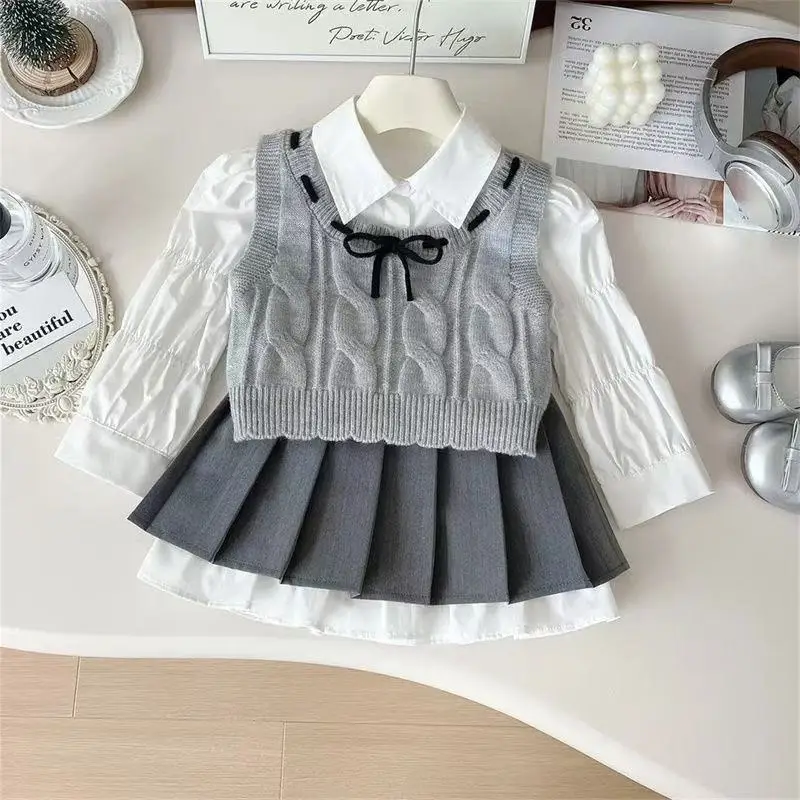 

Girls' Clothing Set Spring and Autumn 2026 New Style Children's College Shirt Knitted Vest pleated Skirt Three-Piece Set