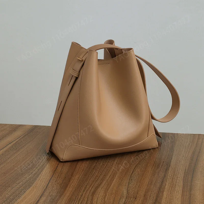 Yao dong bolsa de ombro feminina de couro, tendência da moda, designer de luxo, bolsa balde, grande capacidade, couro genuíno, crossbody b