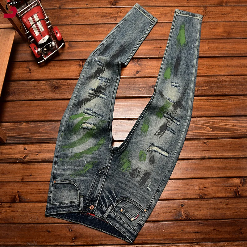 Amerikanische Retro-Jeans für Herren mit Tintenspritzer-Aufdruck, trendige zerrissene Aufnäher, schmal geschnittene Stretch-lange Hose für Herbst und Winter