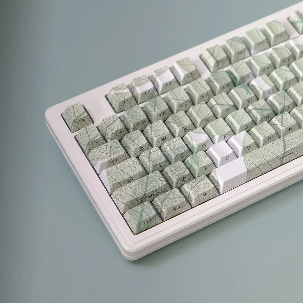 

Leaf textured keycaps, green side engraved transparent keycaps PBT original height, thermal sublimation, mechanical keyboard cap