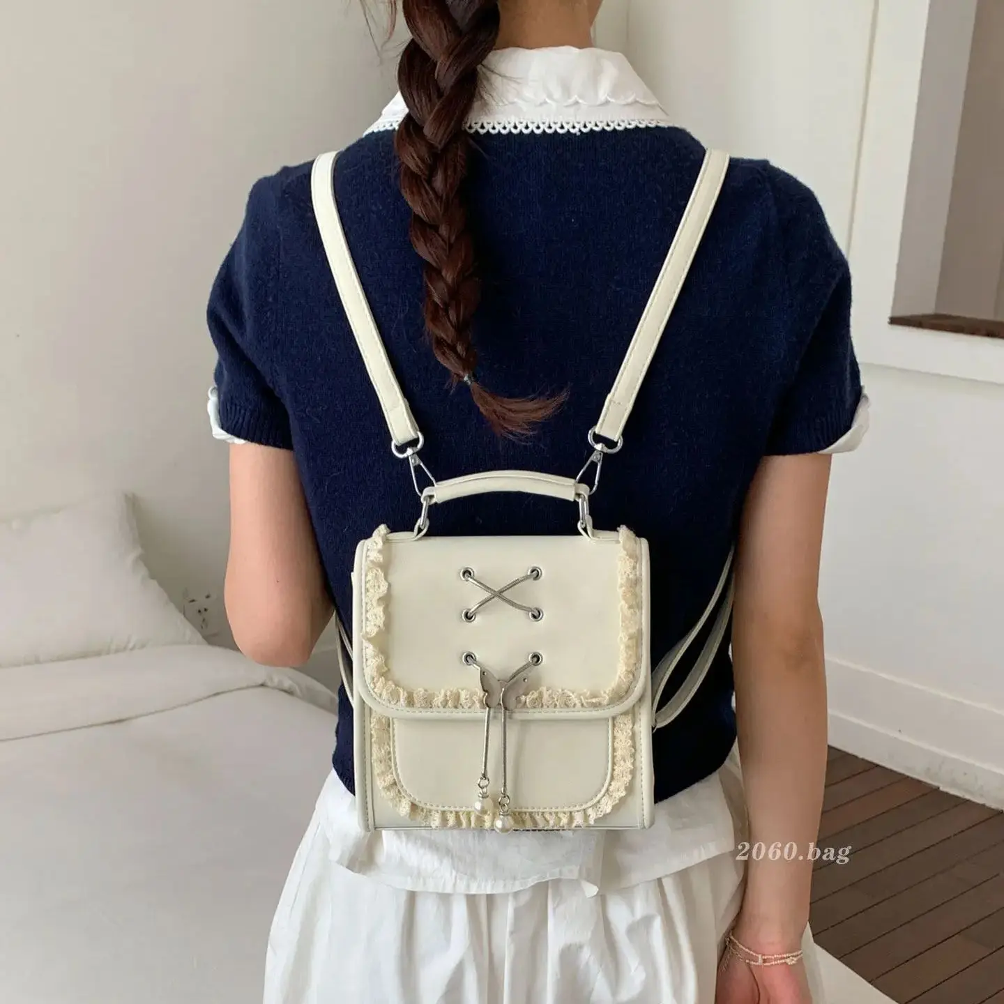 College Style Commuting Flip Backpack 2026 New Daily Versatile Handbag Korean Version High-End PU Leather Lace Women's Backpack