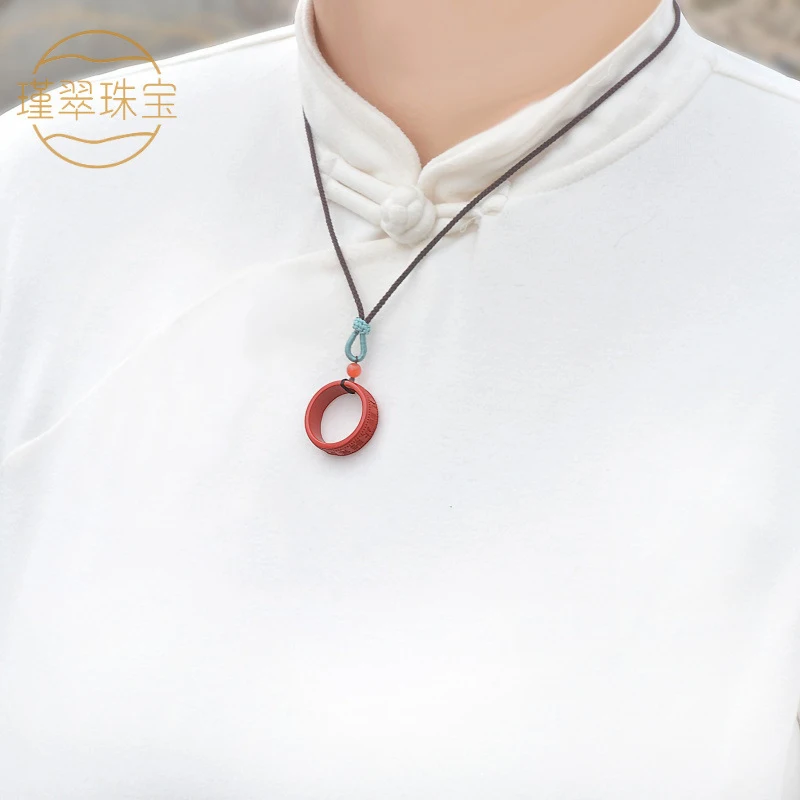 circular pendant with high content of red, suitable both men women, necklace and neck accessory
