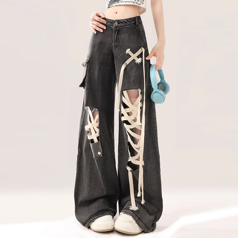

High end design sense, wearing black tie and distressed jeans for women's trendy work clothes, wide leg loose long pants