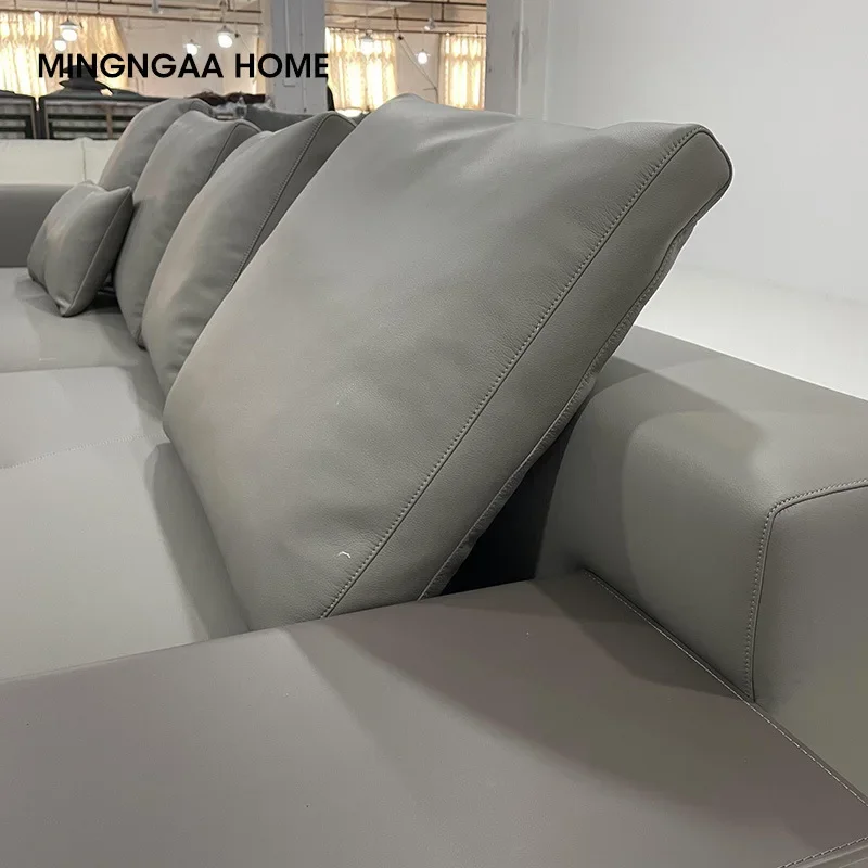 شقة مكتبية لغرفة المعيشة بسيطة وحديثة من الشمال لتخزين كلمة واحدة في الطابق الأول من جلد البقر بحجم شقة أريكة لثلاثة أشخاص