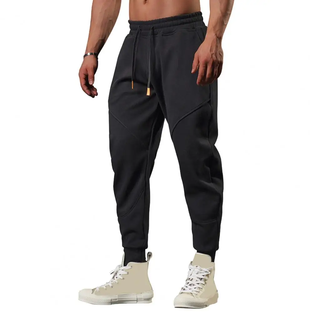 

Spring And Fall Men's Pants Loose Drawstring Elastic Waist Pocket Ankle Strap Solid Color Patchwork Casual Sweatpants