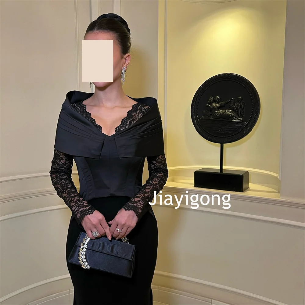 Abiti lunghi con scollo a V a sirena in pizzo con pieghe in jersey semplice personalizzato Taglie per feste su misura disponibili di alta qualità