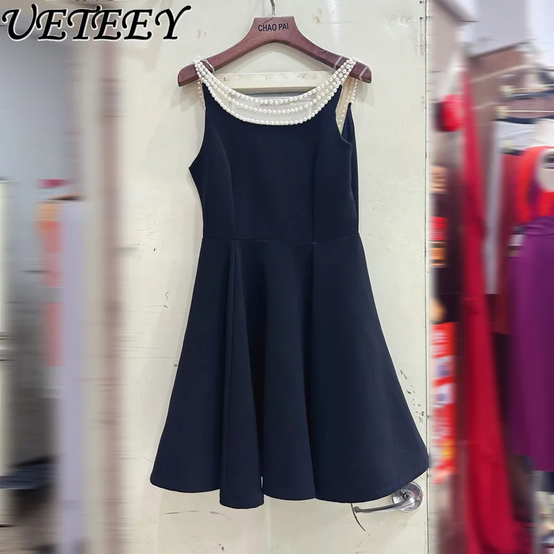 Europejska i amerykańska francuska gwiazda z temperamentem perłowa sukienka na szelkach letnie krótkie sukienki z wysokim stanem i odkrytymi plecami