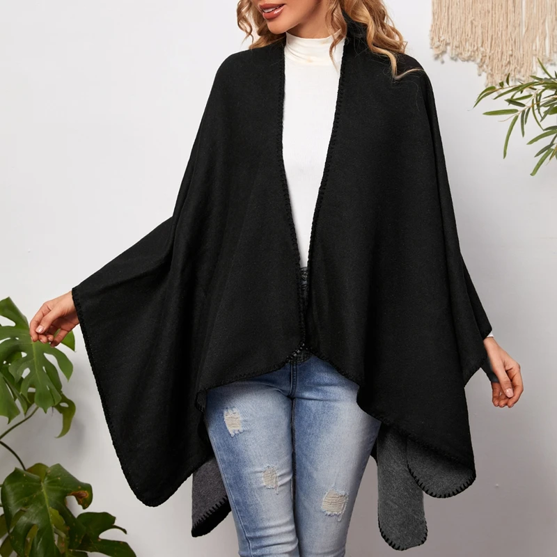 A lady\'s shawl a plain colored, casual, elegant shawl worn by a socialite to keep her warm during winter travel