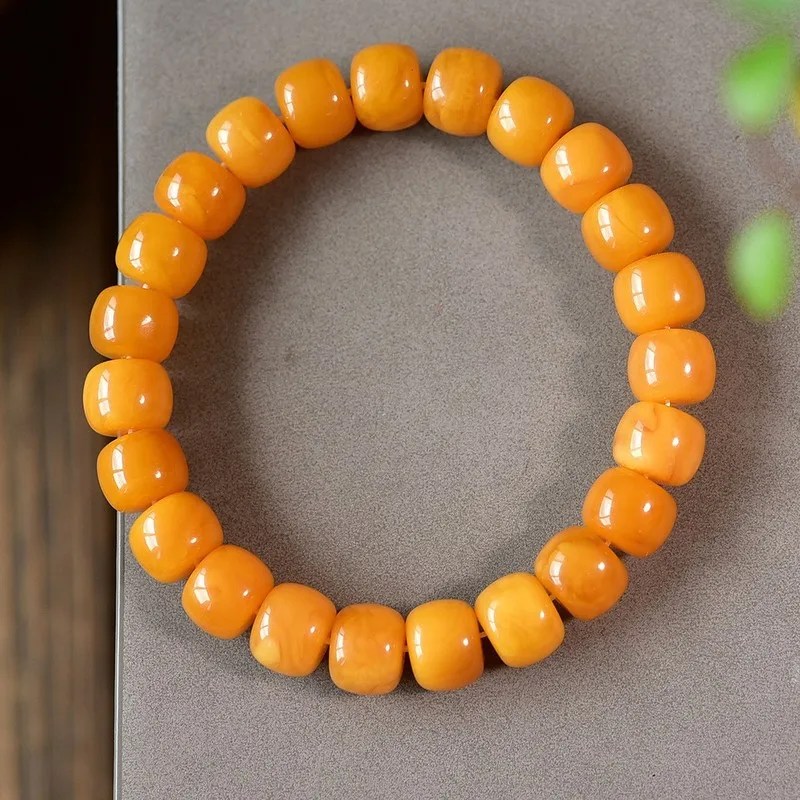 Natural Russian amber chicken-yellow color - single-strand bracelet featuring a 