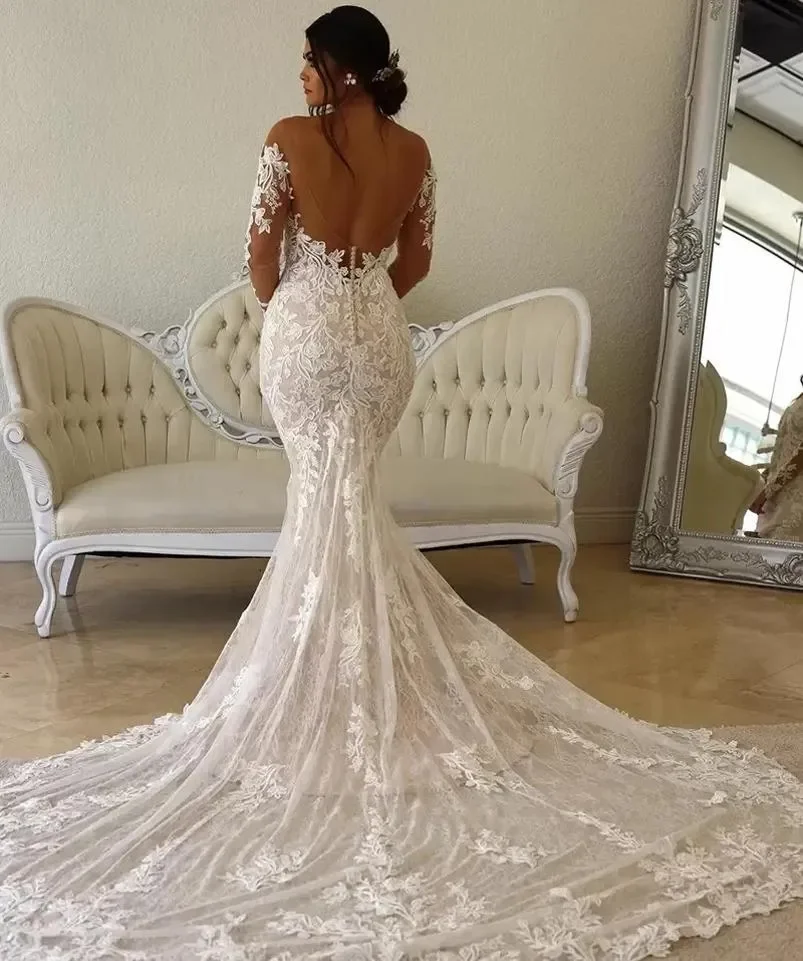 Abiti da sposa a sirena con scollo a O trasparente in pizzo floreale a maniche lunghe senza schienale Abito da sposa a coda di pesce bohémien abito sposa su misura