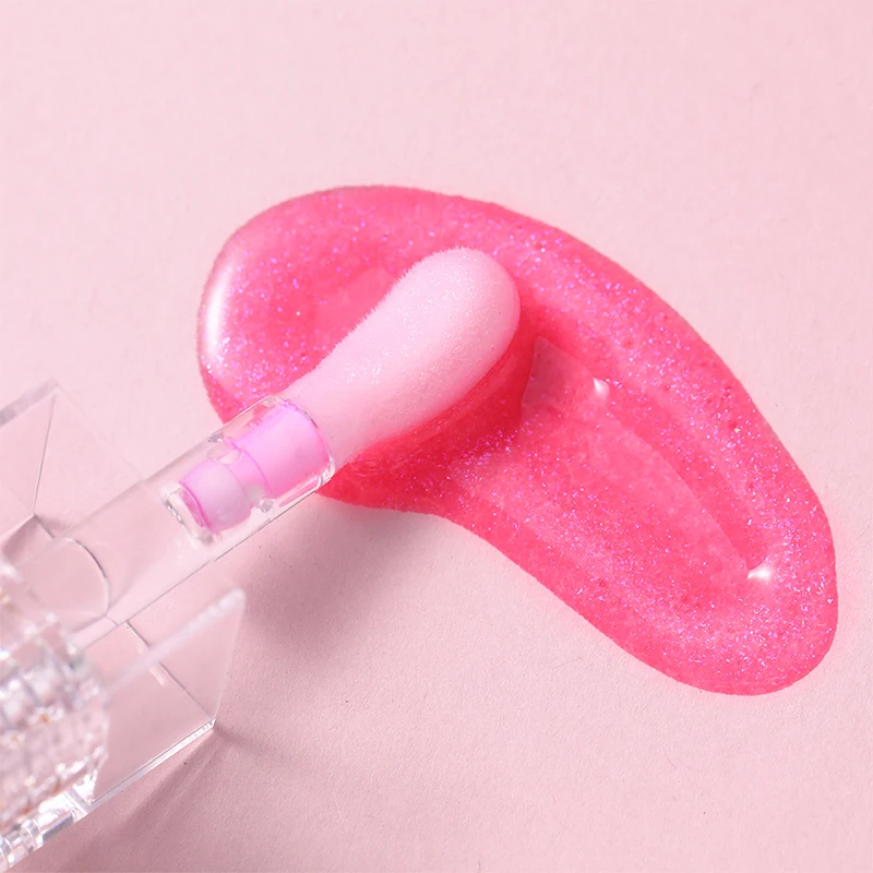 Peach-colored hydrating lip gloss, shiny oily lip gloss, and natural lip brightening product, used for beautifying the lips.