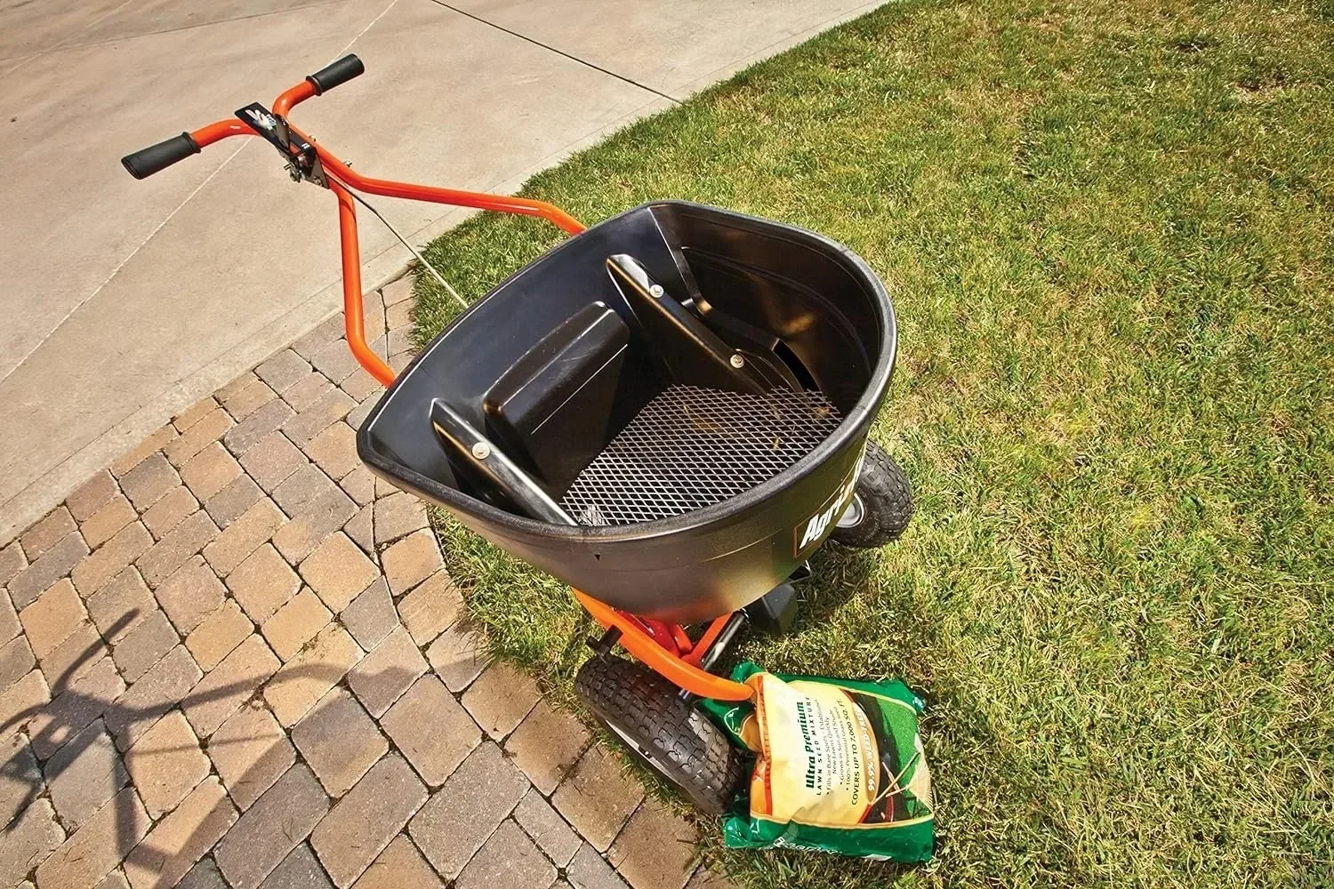 Push Broadcast Spreader, 130-lb Capacity Orange & Black