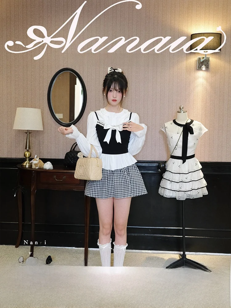 

Комплект из двух предметов: топ с рюшами и пышная юбка. Весенне-осенний модный женский комплект с узлом.