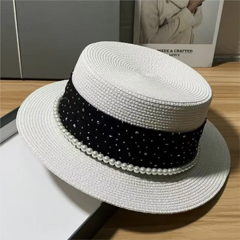 A new style of elegant straw-woven flat-topped hat for women's outing sun-shielding flat-brimmed top