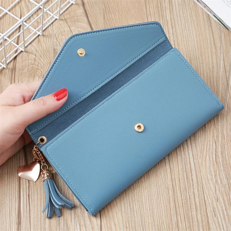 Portamonete di design di marca portafogli in pelle da donna con nappa lunga portafogli per telefono con pochette di lusso portafogli per carte di