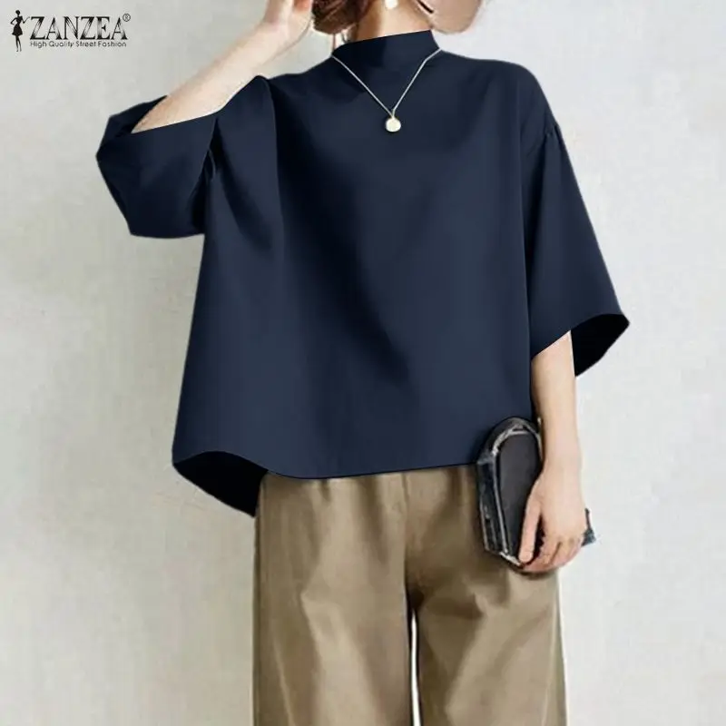 ZANZEA Blus Wanita Model High Low Gaya Kasual Musim Semi 2026 Lengan 3/4 Model Drop-Shoulder Kerah Tegak Polos Atasan Fashion Pakaian Wanita