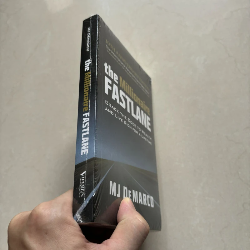 The Millionaire Fastlane by MJ DeMarco Crack the Code to Wealth and Live Rich for a Lifetime Paperback in English