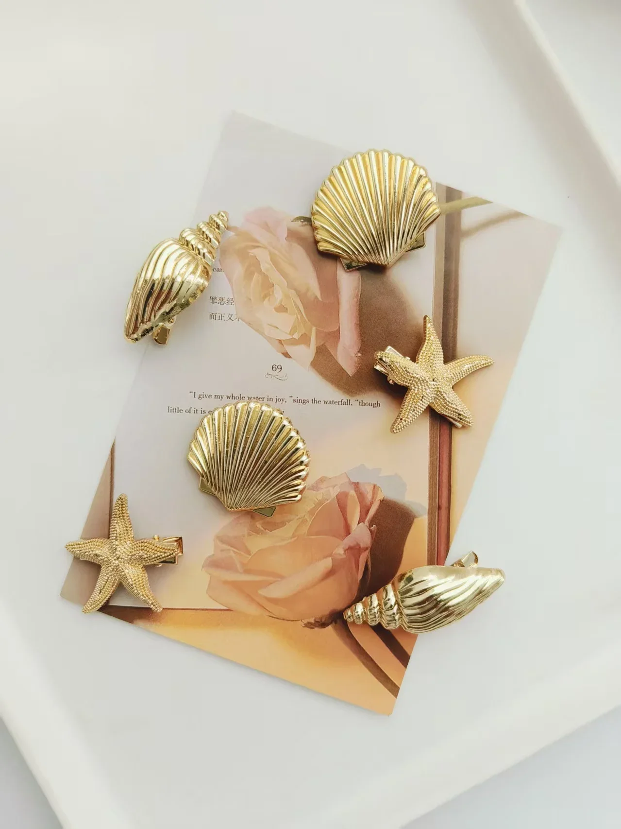 

6pcs Fashion Golden Ocean themed Hair Clips with Shell Conch Starfish Shapes for Women Girls Daily and Travel Hair Accessories