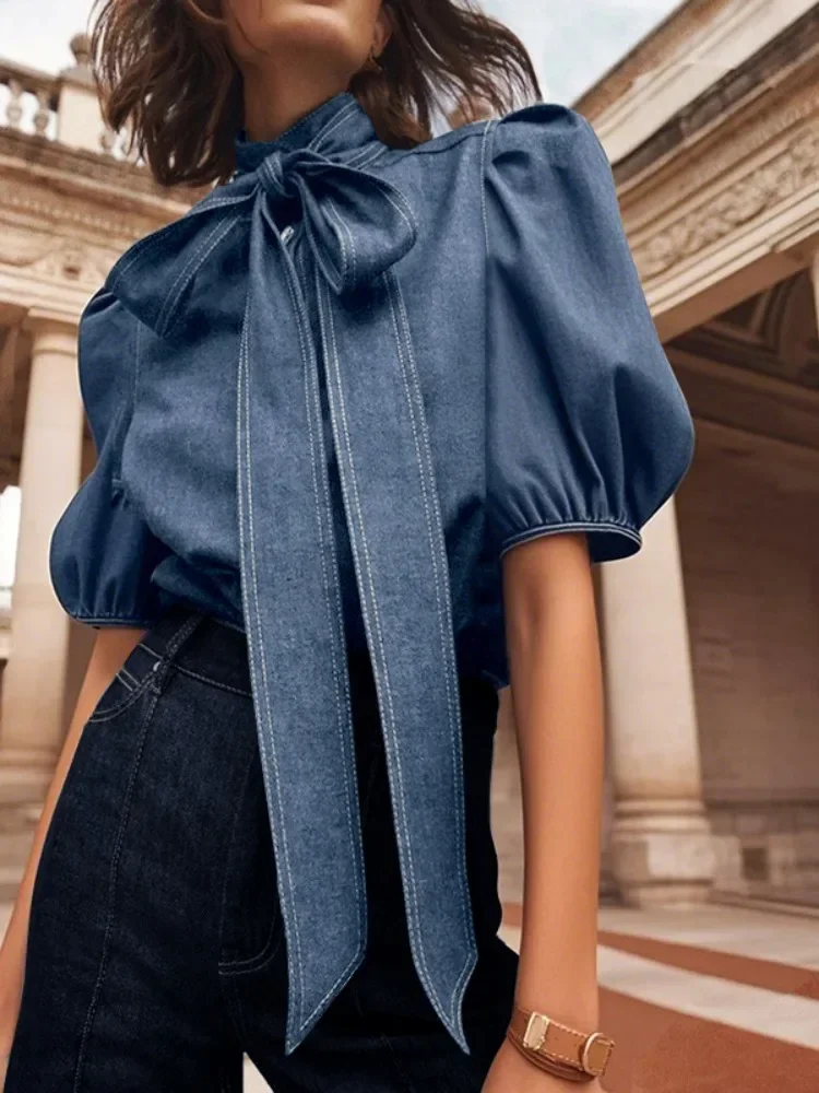 Beautyblue المرأة موضة عالية الرقبة تقليد قمصان جينز نفخة الأكمام البلوزات الصيف جديد عادية بلون ربطة القوس فيونكة القمم الإناث