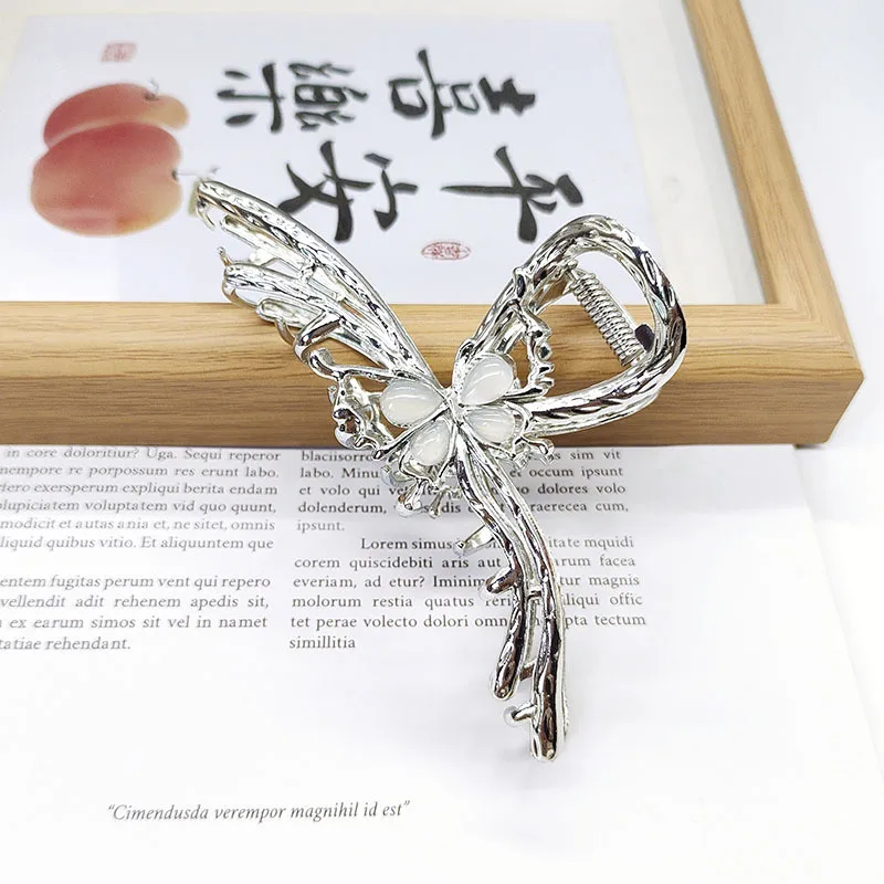 

High-end, niche and fashionable liquid butterfly cat's eye stone metal hairpins are often used with large hairpins