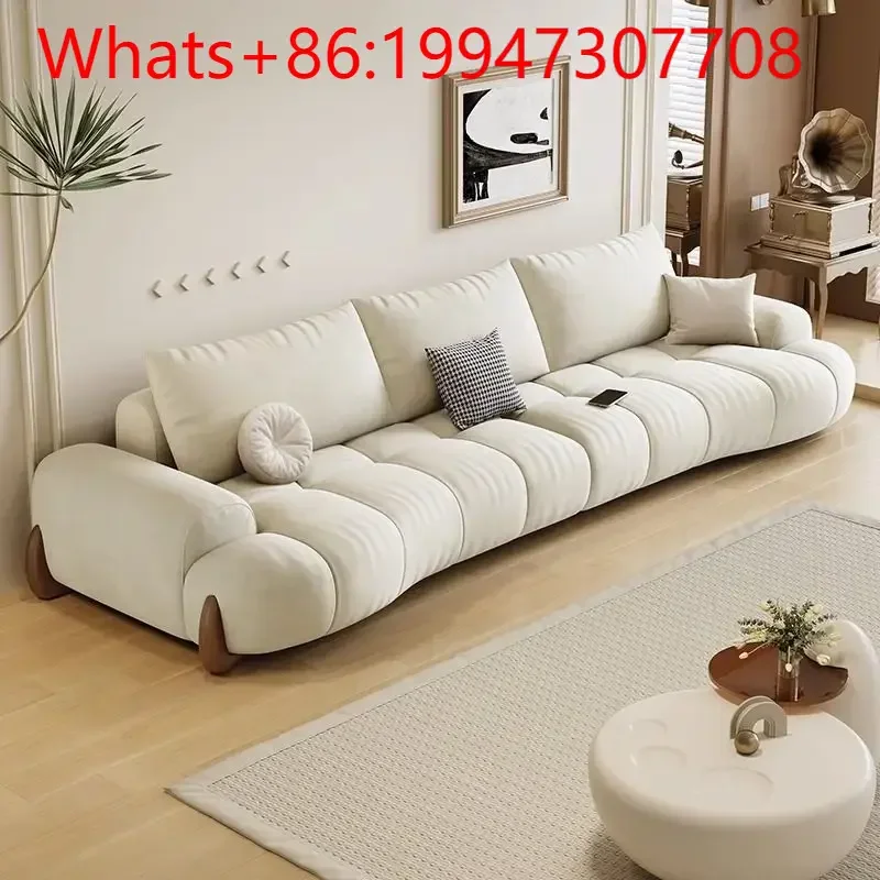 

New cat claw cloth sofa living room new small apartment modern simple white cream wind curved cat scratching leather sofa