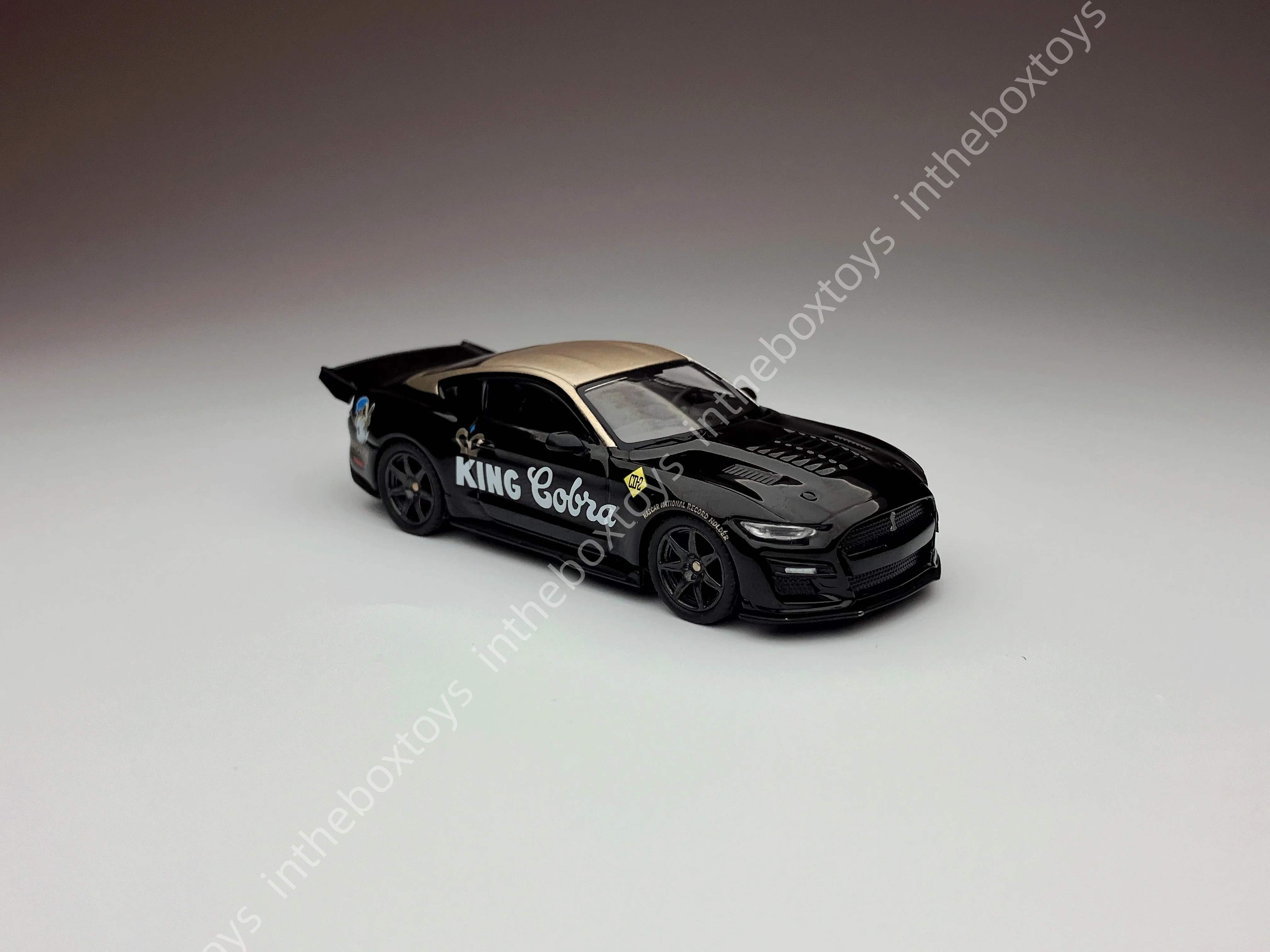 

Mini GT #1130 GT500 Dragon Snake Concept Black Gold 1/64 Diecast Alloy