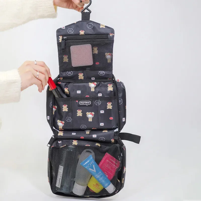 Sanrio Hello Kitty borsa per il trucco portatile pieghevole per la casa Cute Cartoon Travel Wash Multi Functional antipolvere Storage Hanging Bag