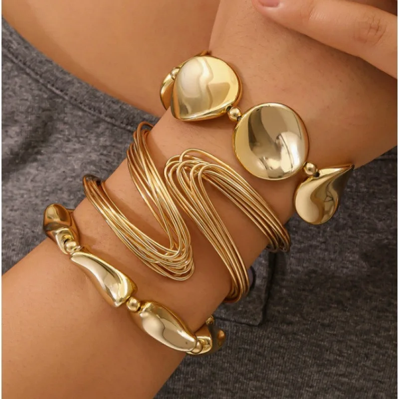 Gold-Plated Bangle Bracelet Set Variety Including Oval Drop - Shaped And Twisted Wire Designs Trendy Stackable Jewelry For Women