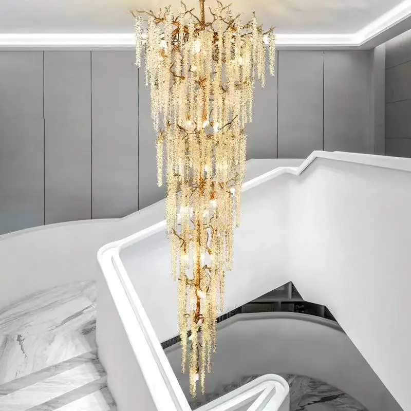 

Modern Branch Crystal Chandelier - This dimmable ceiling lamp features a sculptural form & brilliant lustre for a sleek interior