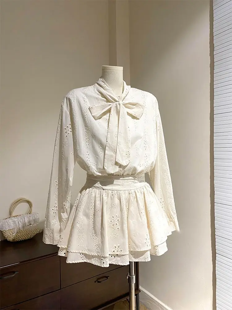 الخريف الفرنسية أنيقة 2 قطعة مجموعة المرأة الشريط الجوف خارج تصميم الرجعية القمم + Harajuku شيك تنورة صغيرة الإناث الكورية نمط الملابس