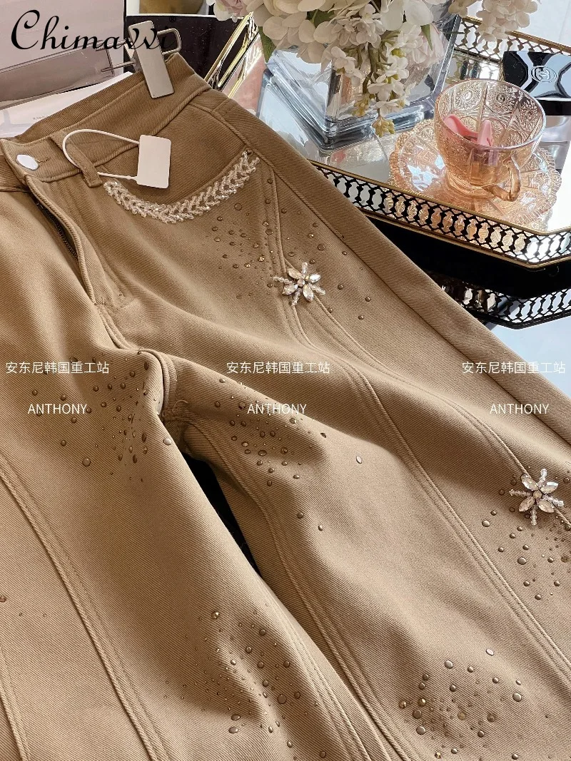 سراويل أبي سميكة مبطنة بالصوف للنساء ملابس شتوية 2025 جينز ريترو جديد ثقيل من حجر الراين عالي الخصر للتخسيس