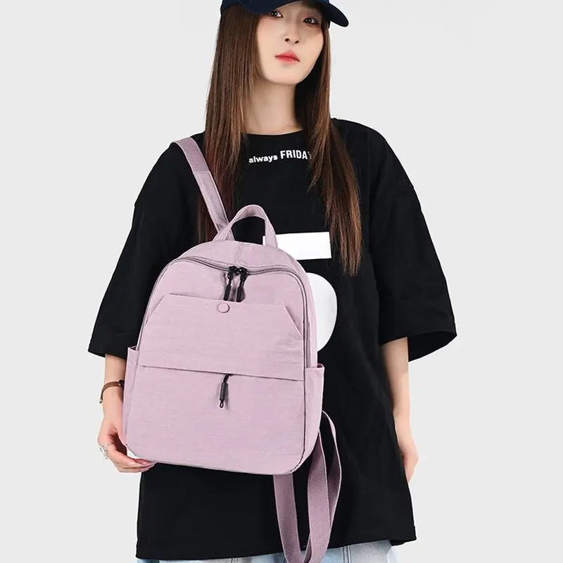 Women Minimalist Black Backpack With Textured Fabric Multiple Pockets Lightweight Travel Commuter Daypack Casual Rucksack
