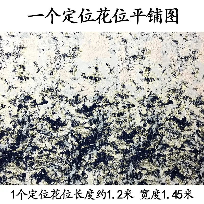 The dress is made of jacquard fabric and brocade featuring golden thread dyed graffiti