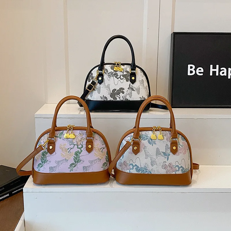 

2025 Summer Vintage Floral Clutch Bag - Trendy Shell-Shaped Tote with Retro Prints for Fashionable Crossbody & Handheld Use